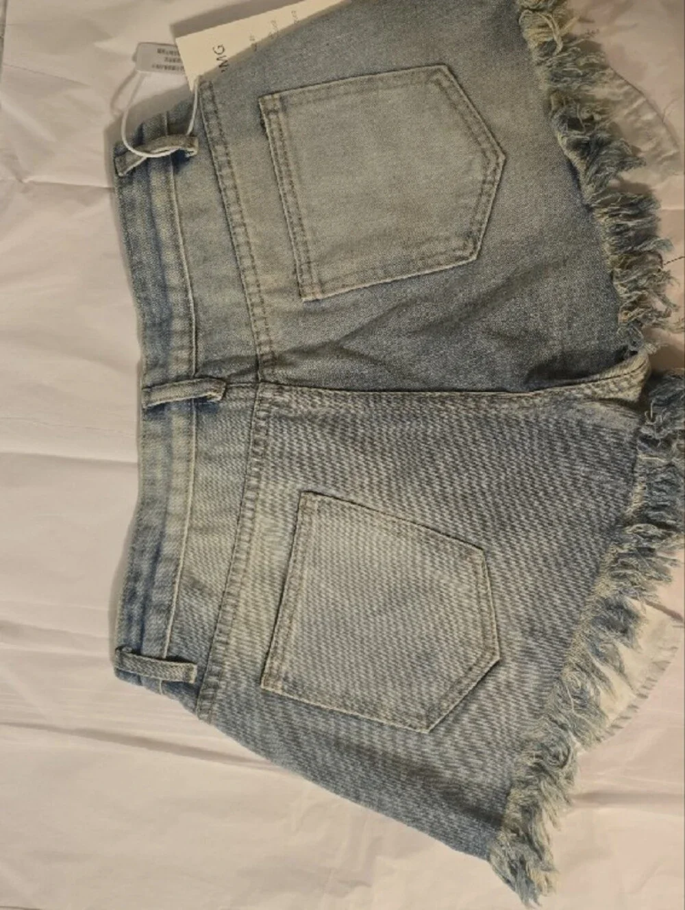 Light Blue Distressed Denim Fringe Hem Jean Shorts